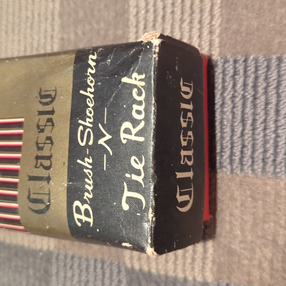 Vintage antique Classic brush, shoehorn, and tie rack with sculpted horse theme.